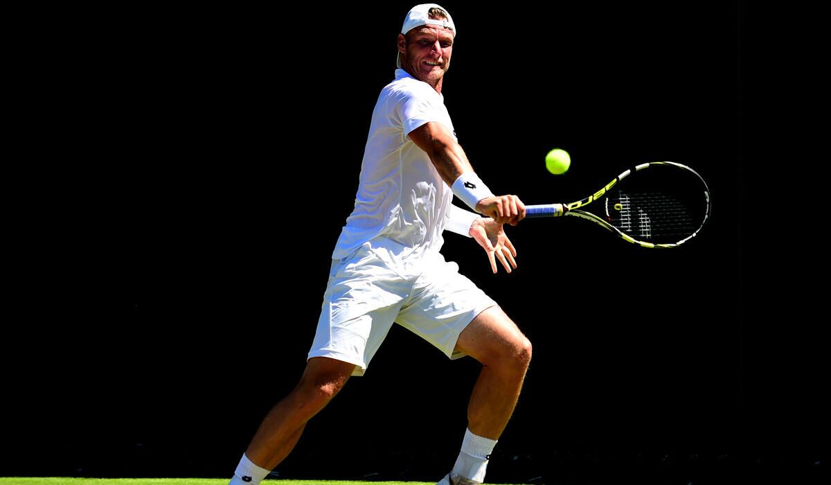 Sam Groth in action during a first round match against Jack Sock during day two of Wimbledon on Tuesday.