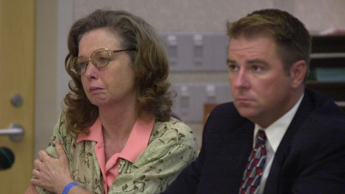 Jane Dorotik listens to testimony during a sentencing hearing in San Diego County Superior Court on July 26, 2001. Defense attorney Cole Casey is seated next to her.