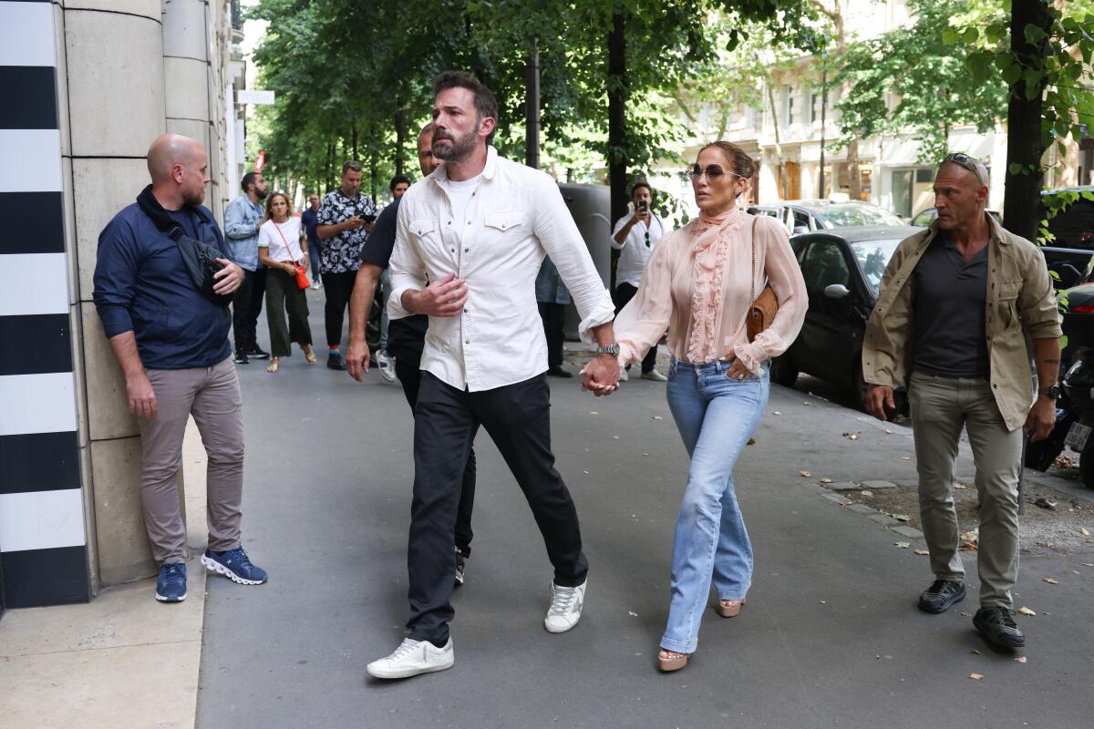 Jennifer Lopez and husband Ben Affleck are seen at a Sephora store in Paris on July 25. 