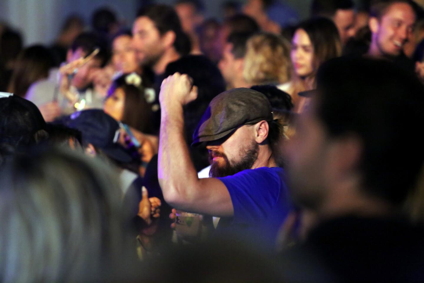 Actor Leonardo DiCaprio feels the groove at the Neon Carnival.