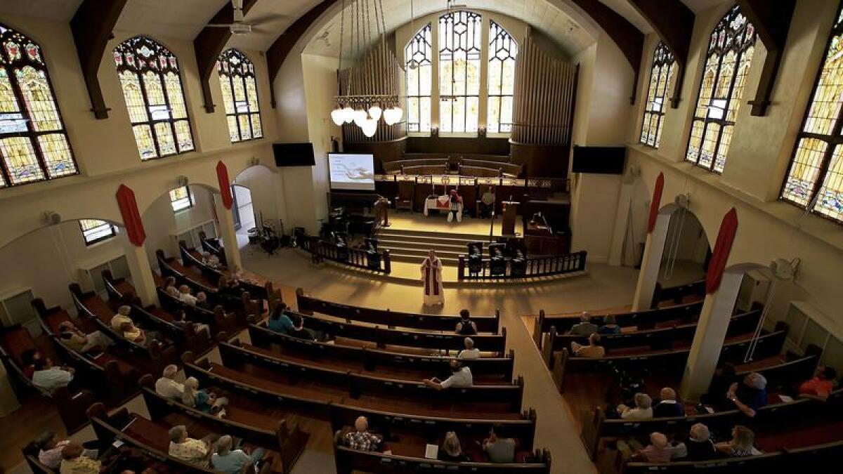 The Rev. Ruth Marsh leads Sunday services at Trinity United Methodist Church in Idaho Falls. The church plans to sell meals and rent spaces in its parking lot to people coming to witness the eclipse.