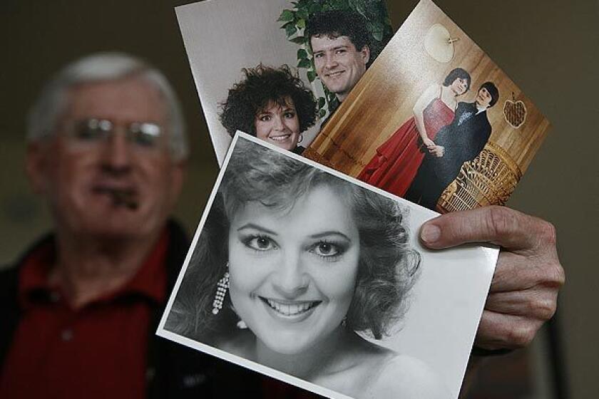 Jim Palin, father-in-law of Alaska Gov. Sarah Palin, shows family photos of the newly selected GOP running mate: the former Sarah Heath as beauty contestant; Sarah with her high school prom date, Todd; and Sarah and Todd again in 1991, after their marriage.
