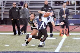 Birmingham quarterback Jessica Rose avoids a San Pedro defender.