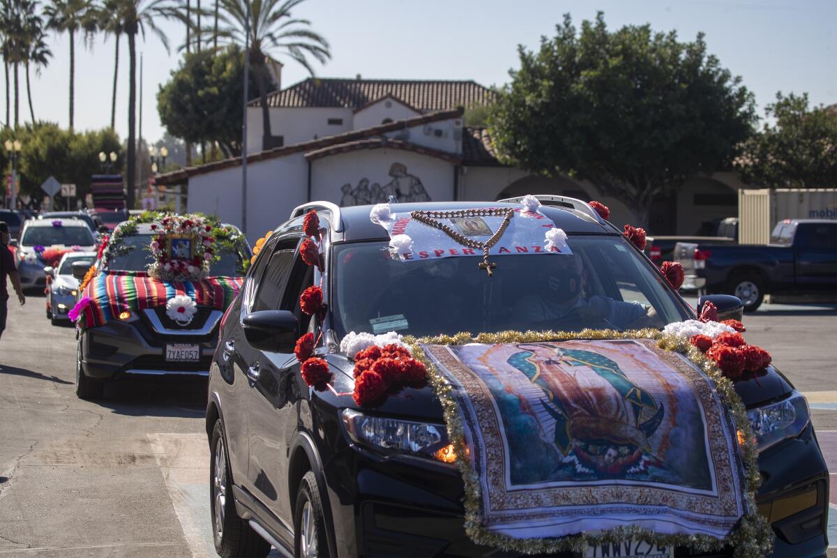 The 89th annual Procession and Mass in honor of Our Lady of Guadalupe was part caravan this year.