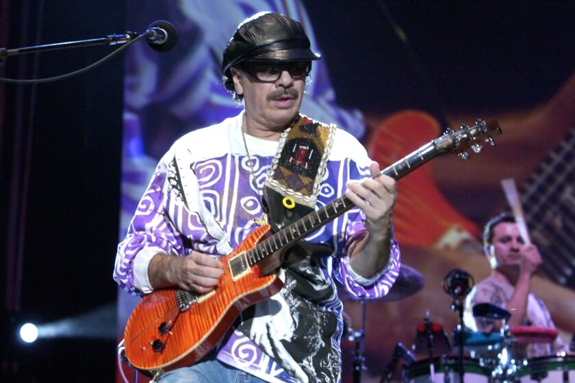 SYDNEY - MARCH 27: Rock legend Santana performs at Centennial Park for his first concert in Sydney during his Australian tour. (Photo by Patrick Riviere/Getty Images).