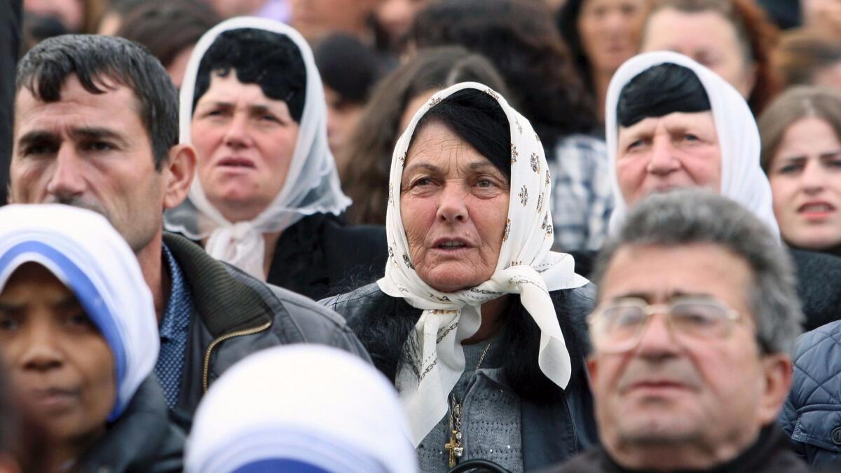 Albanian worshipers attend a ceremony to celebrate the beatification of 38 Roman Catholic martyrs in the town of Shkoder on Nov. 5, 2016.
