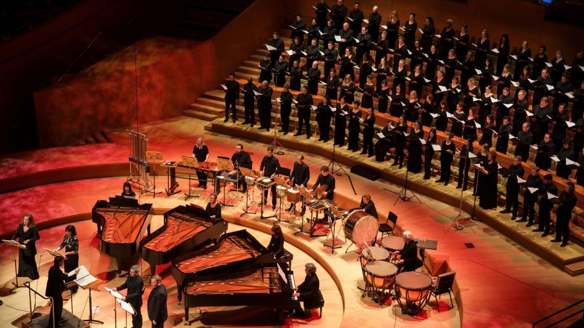 Soloists, from left, Elissa Johnston, Niké St. Clair, Todd Strange and Nicholas Brownlee perform Stravinsky's "Les Noces" with the Los Angeles Master Chorale at Walt Disney Concert Hall on Sunday.