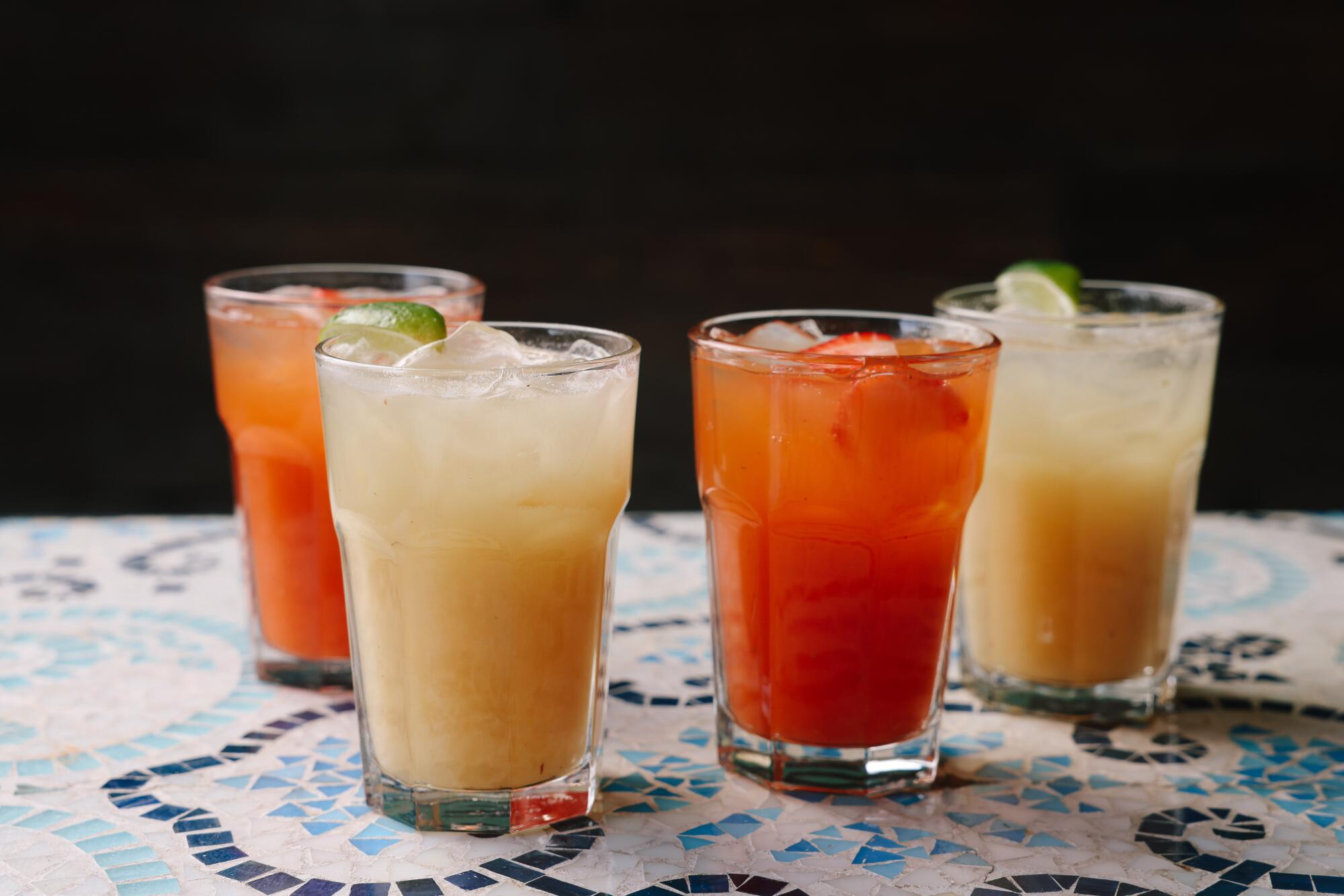 Nonalcoholic drinks Red Alert and Coconut-Pina-Guava Fresca from the book "Trejo's Cantina." 