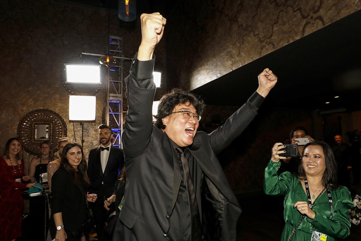 “Parasite” director Bong Joon Ho celebrates at the 2020 SAG Awards.