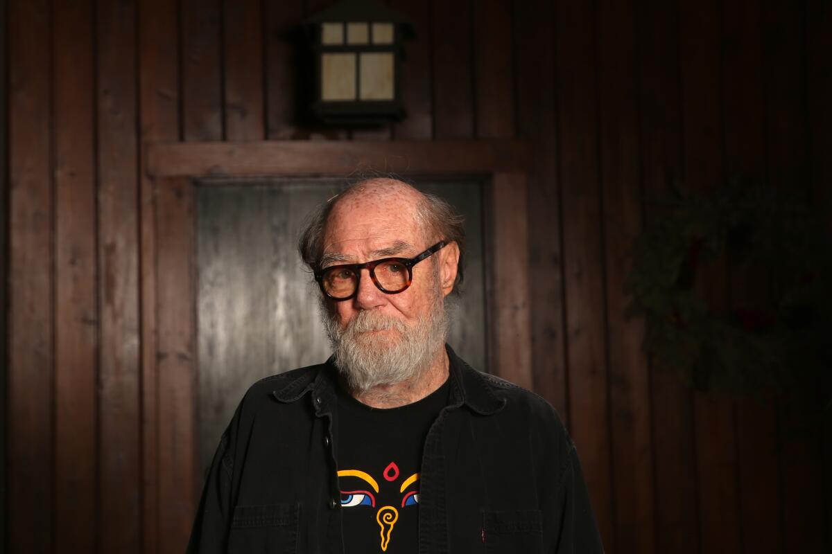 Artists Paul McCarthy stands inside his Altadena home in late May.
