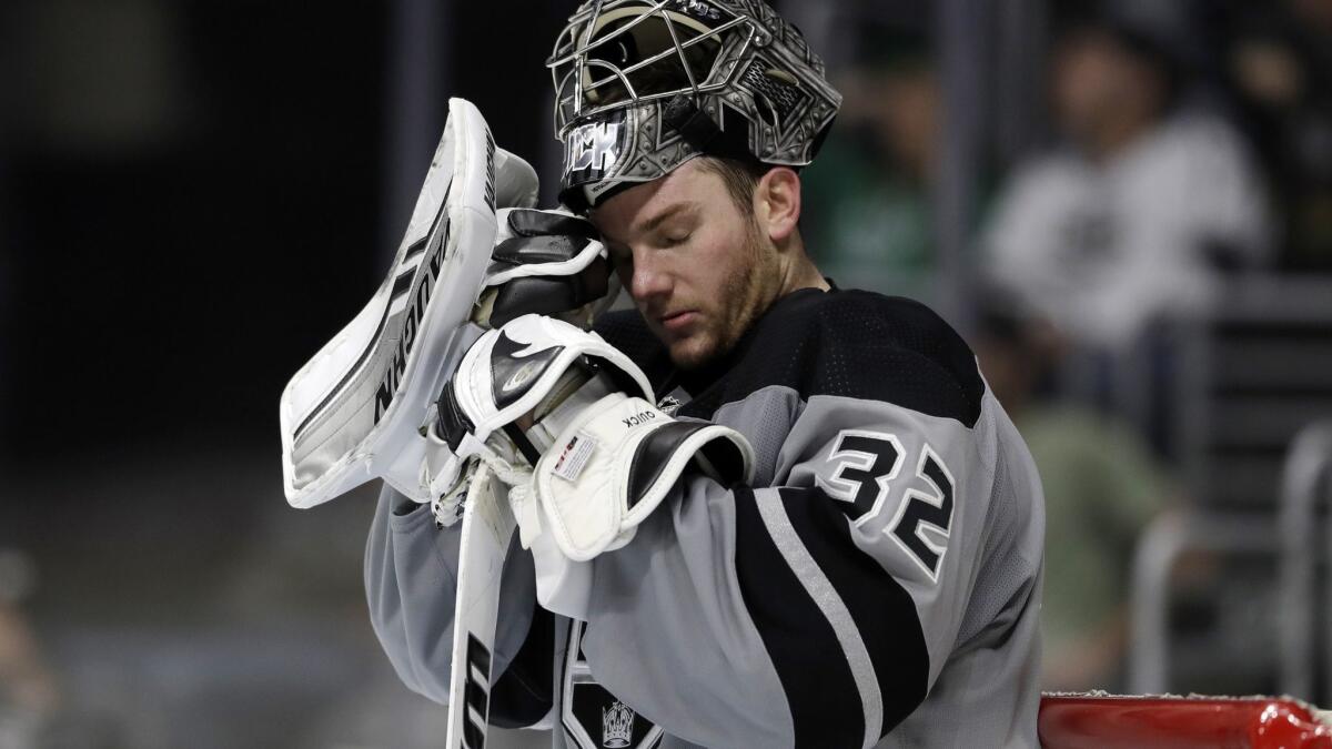 Kings goaltender Jonathan Quick takes a breather after giving up a goal to the Panthers' Jonathan Huberdeau during the third period Saturday.