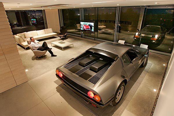 Holger Schubert's Ferrari 512 BBi "Boxer" is parked in the living room of his Brentwood home. Last year the garage won Architectural Digest magazine's Design Driven contest.