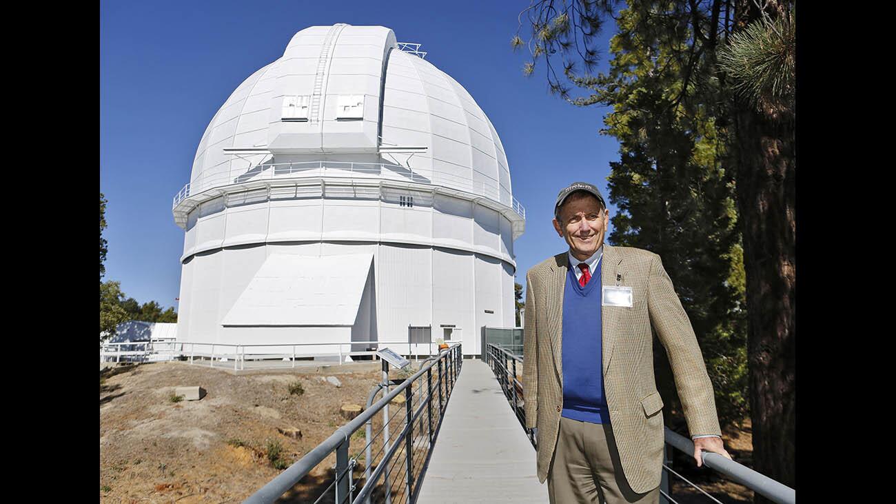 Mt. Wilson Institute Board of Trustees chairman and CEO Samuel D. Hale stands outside the dome of the Hooker 100-inch telescope on the 100th anniversary of completion and first successful viewing of the stars, at Mt. Wilson in the Angeles National Forest on Wednesday, Nov. 1, 2017. His grandfather George Ellery Hale built the telescope in the mountains north of Los Angeles.