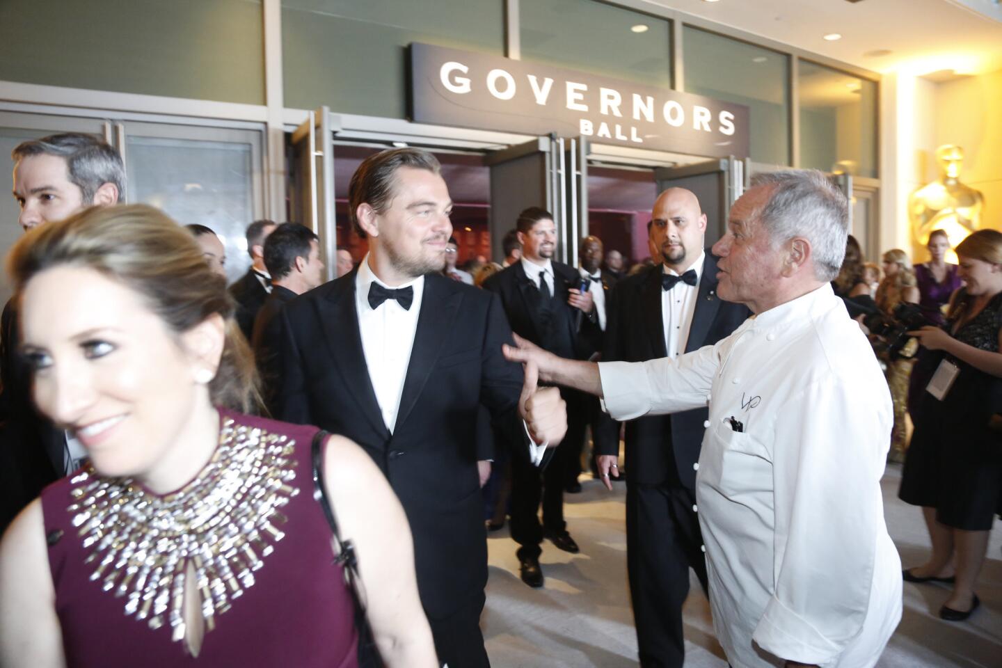 Leonardo DiCaprio and Wolfgang Puck at the 88th Academy Awards Governors Ball.