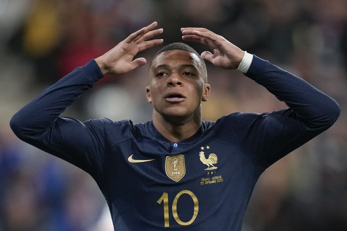 France's Kylian Mbappe reacts after missing a chance to score during the UEFA Nations League soccer match between France and Austria at the Stade de France stadium in Saint Denis, outside Paris, France,Thursday, Sept. 22, 2022. (AP Photo/Christophe Ena)