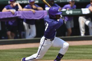 TCU's Austin Davis connects with two-run single against Arkansas during the second inning of an NCAA college baseball tournament regional championship game in Fayetteville, Ark. Monday, June 5, 2023. (Andy Shupe/The Northwest Arkansas Democrat-Gazette via AP)