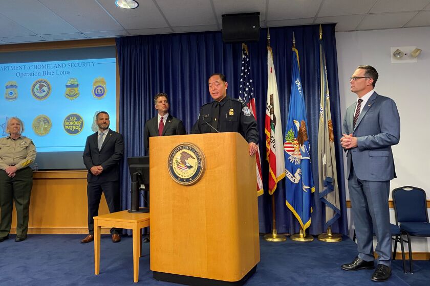 CBP Director of Field Operations Sidney Aki speaks Tuesday at a press conference alongside U.S. Attorney Randy Grossman.