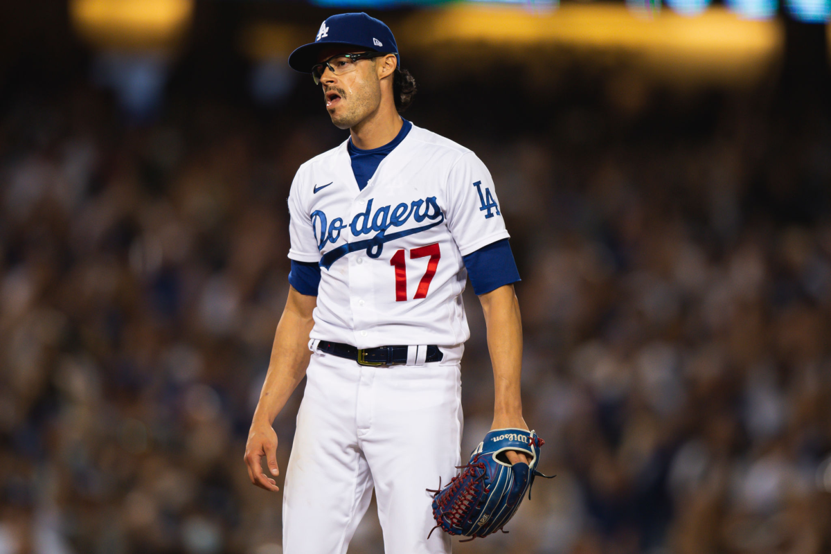 Dodgers relief pitcher Joe Kelly reacts after striking out San Diego's Tommy Pham.