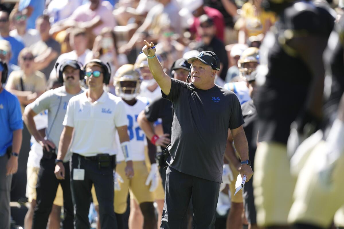 UCLA coach Chip Kelly instructs his players during a 45-17 win over Colorado on Saturday.