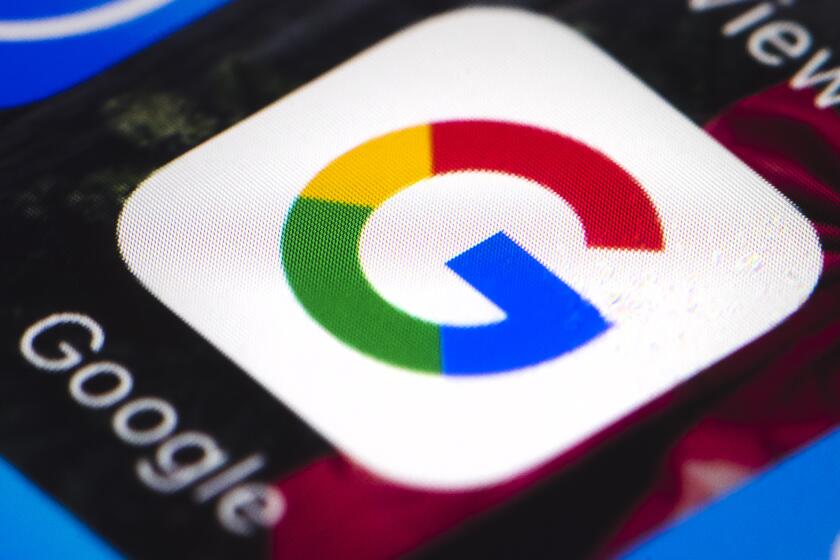 This April 26, 2017 file photo shows the Google mobile phone icon, in Philadelphia. Alphabet Inc., parent company of Google, reports financial results, Tuesday, April 27, 2021. Google’s digital advertising network has shifted back into high gear after an unprecedented reversal during the early stages of the pandemic. (AP Photo/Matt Rourke)