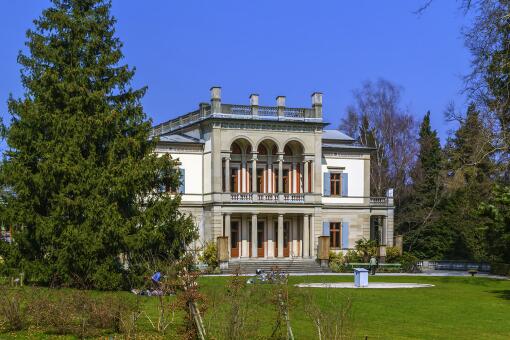 A photo of buildings of Wesendonck Villa in Rieter Park in Zurich, Switzerland