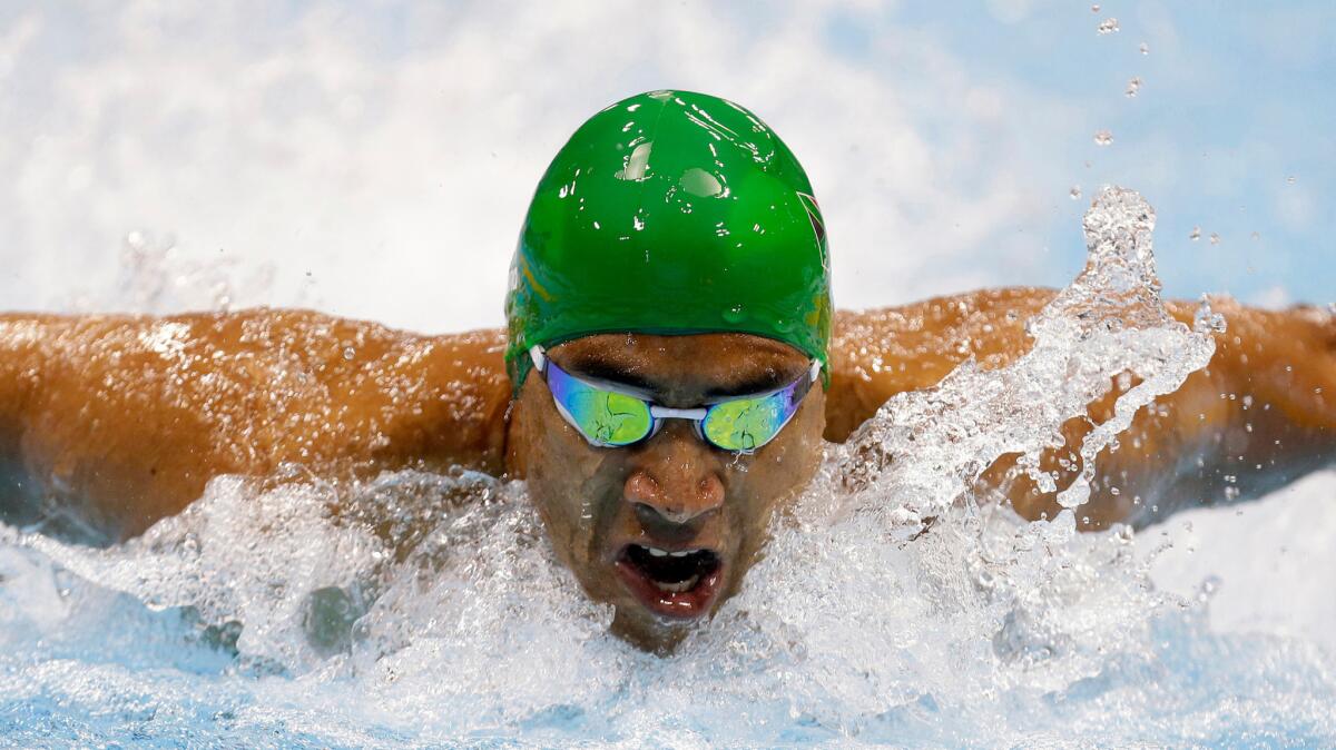 Achmat Hassiem swims the 100-meter butterfly at the 2012 Paralympics in London.