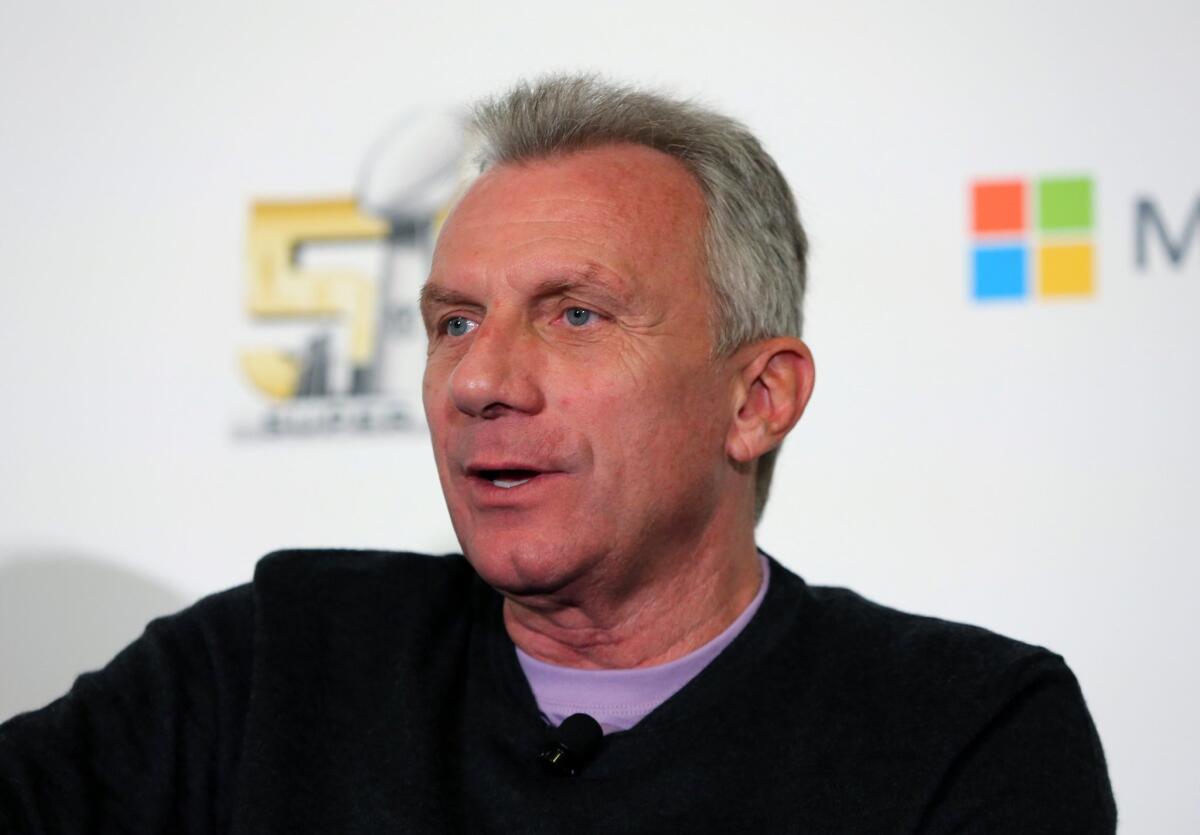 Joe Montana speaks to reporters during a panel at Super Bowl 50 in San Francisco in 2015.