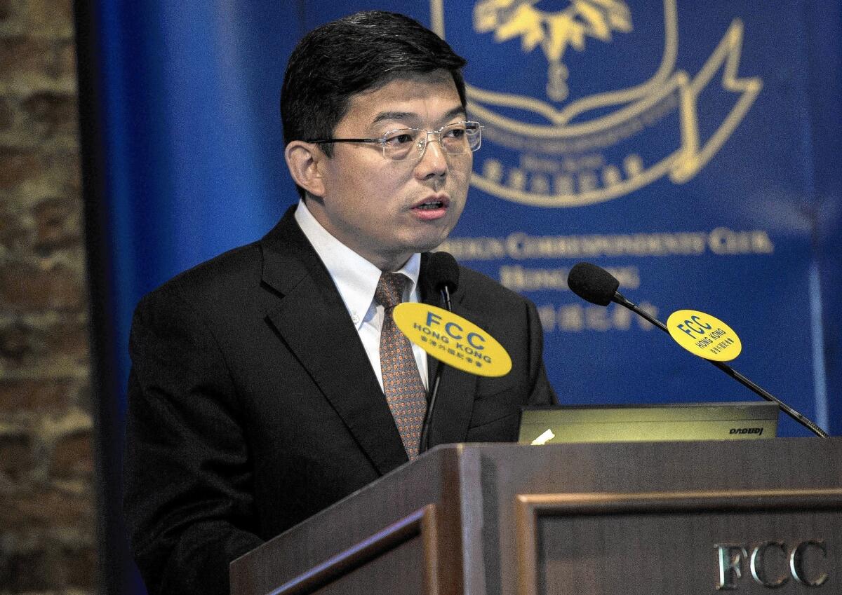 Wang Zhenmin, dean of the Tsinghua University School of Law in Beijing, called for Hong Kong to accept Beijing's rules for the territory's election for chief executive.