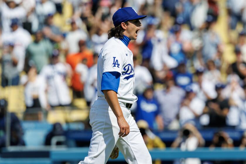 LOS ANGELES, CA - JULY 25, 2024:Los Angeles Dodgers relief pitcher Brent Honeywell (40) reacts after getting the final out in the Dodgers 6-4 win over the San Francisco Giants at Dodgers Stadium on July 25, 2024 in Los Angeles, California.(Gina Ferazzi / Los Angeles Times)