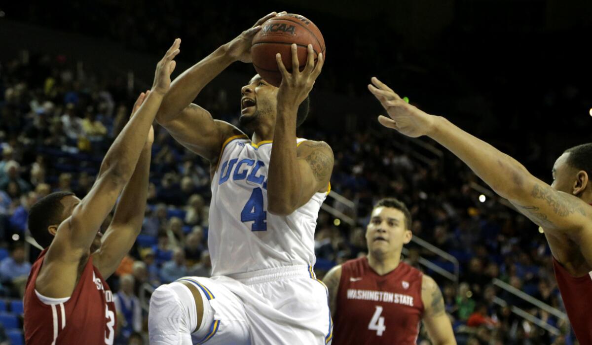 UCLA guard Norman Powell elevates for a layup against Washington State in the first half Sunday at Pauley Pavilion.