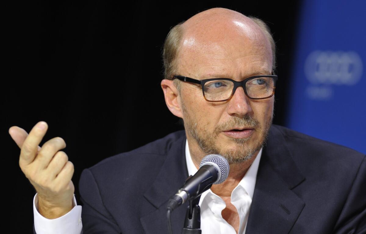 Canadian director Paul Haggis attend the press conference for 'Third Person' during the 38th annual Toronto Film Festival, in Toronto, Canada.