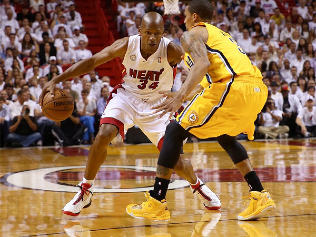 Miami's Ray Allen, shown handling the ball against Indiana's George Hill, is one for six from three-point range against the Pacers in the Western Conference finals.