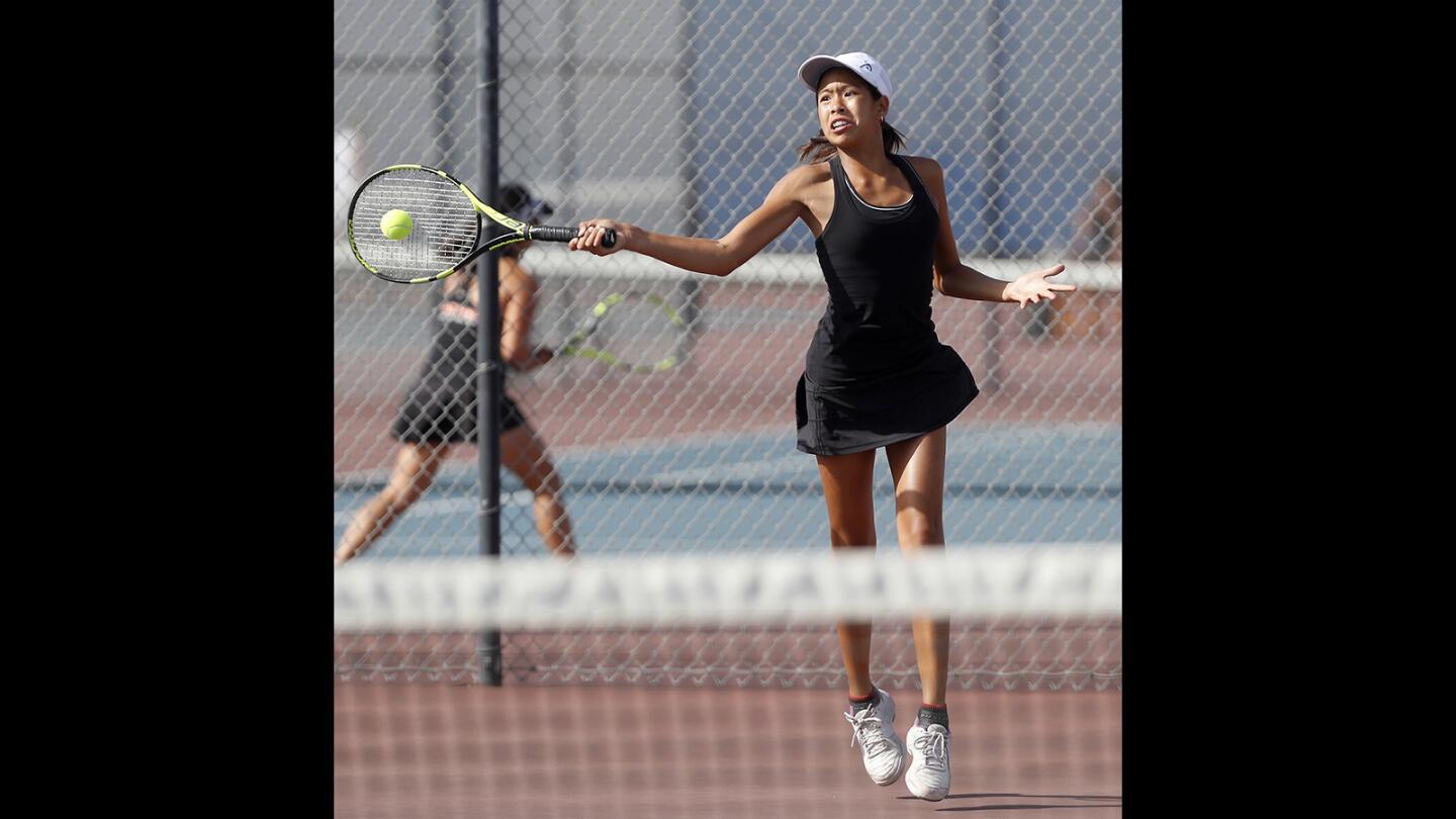 Huntington Beach High freshman Cindy Huynh competes against Fountain Valley during a No. 3 singles set in a Sunset Conference crossover match in Fountain Valley on Thursday, Sept. 20.