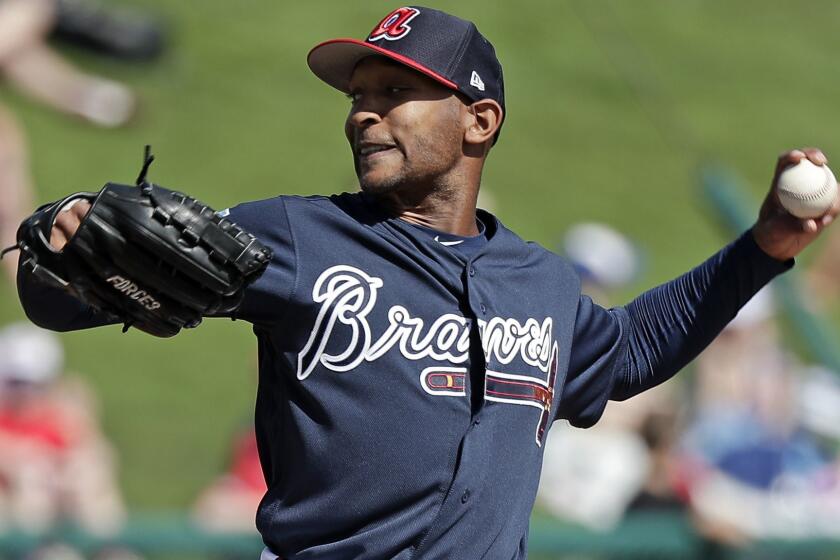 Atlanta Braves' Sam Freeman pitches against the Washington Nationals in the third inning of a spring baseball exhibition game, Monday, Feb. 25, 2019, in Kissimmee, Fla. (AP Photo/John Raoux)