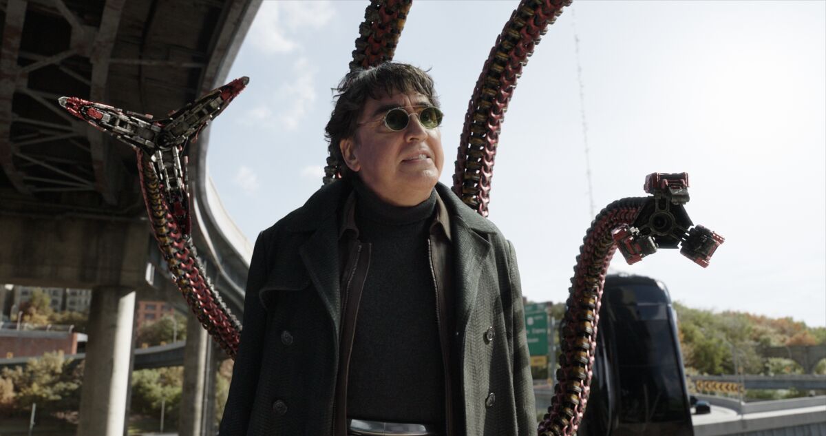 A man with mechanical tentacles wearing sunglasses