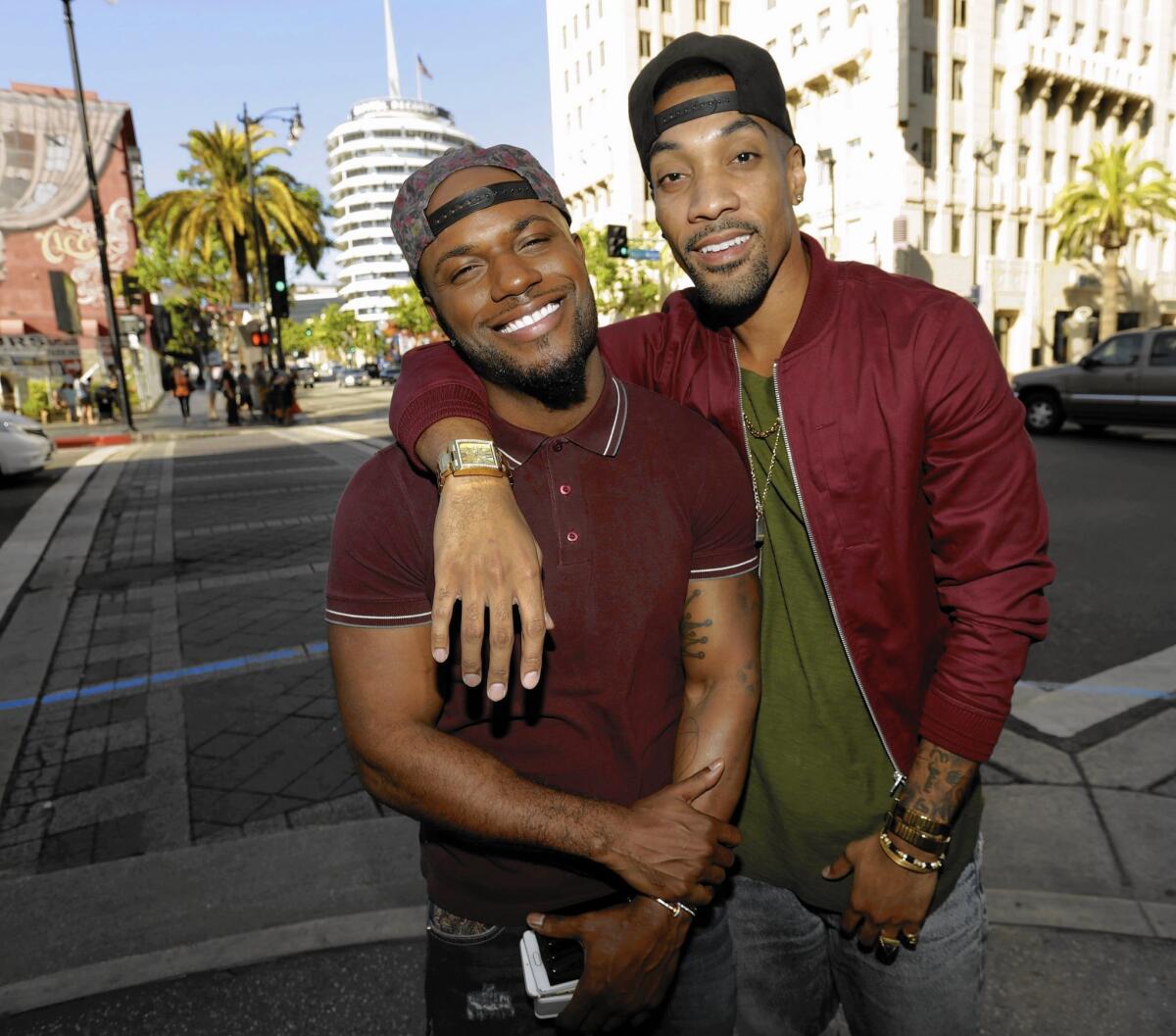 "Love & Hip Hop: Hollywood" personalities Milan Christopher, left, and Miles Brock are a couple in a music genre where gay slurs have been prevalent.