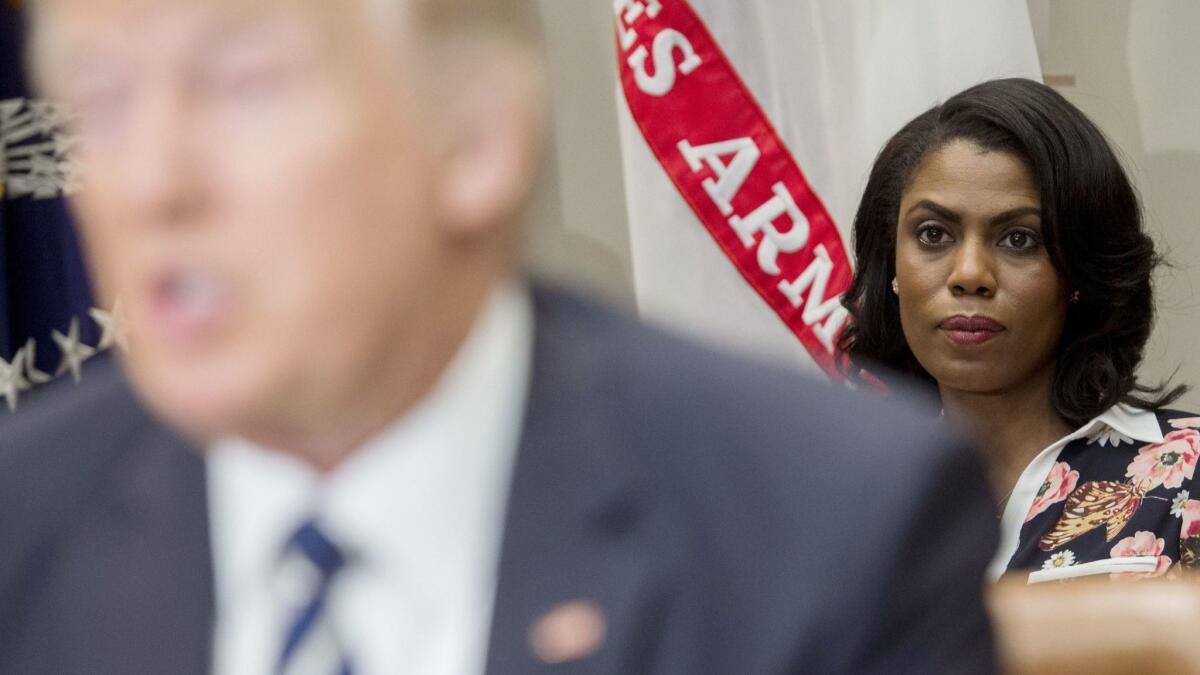 Omarosa Manigault Newman watches while President Trump speaks at the White House in February 2017.