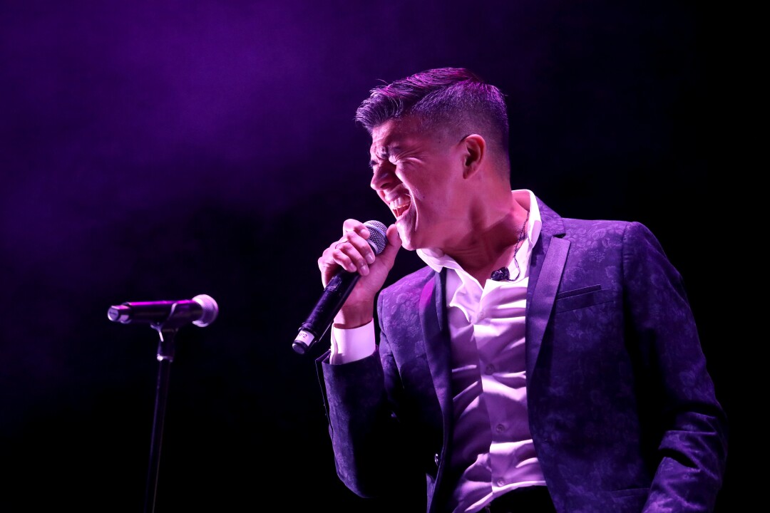 Guest artist Américo performs with Los Angeles Azules in Greensboro