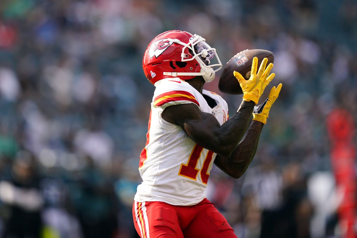 Kansas City Chiefs wide receiver Tyreek Hill (10) scores a touchdown during the second half of an NFL football game against the Philadelphia Eagles on Sunday, Oct. 3, 2021, in Philadelphia. (AP Photo/Matt Rourke)