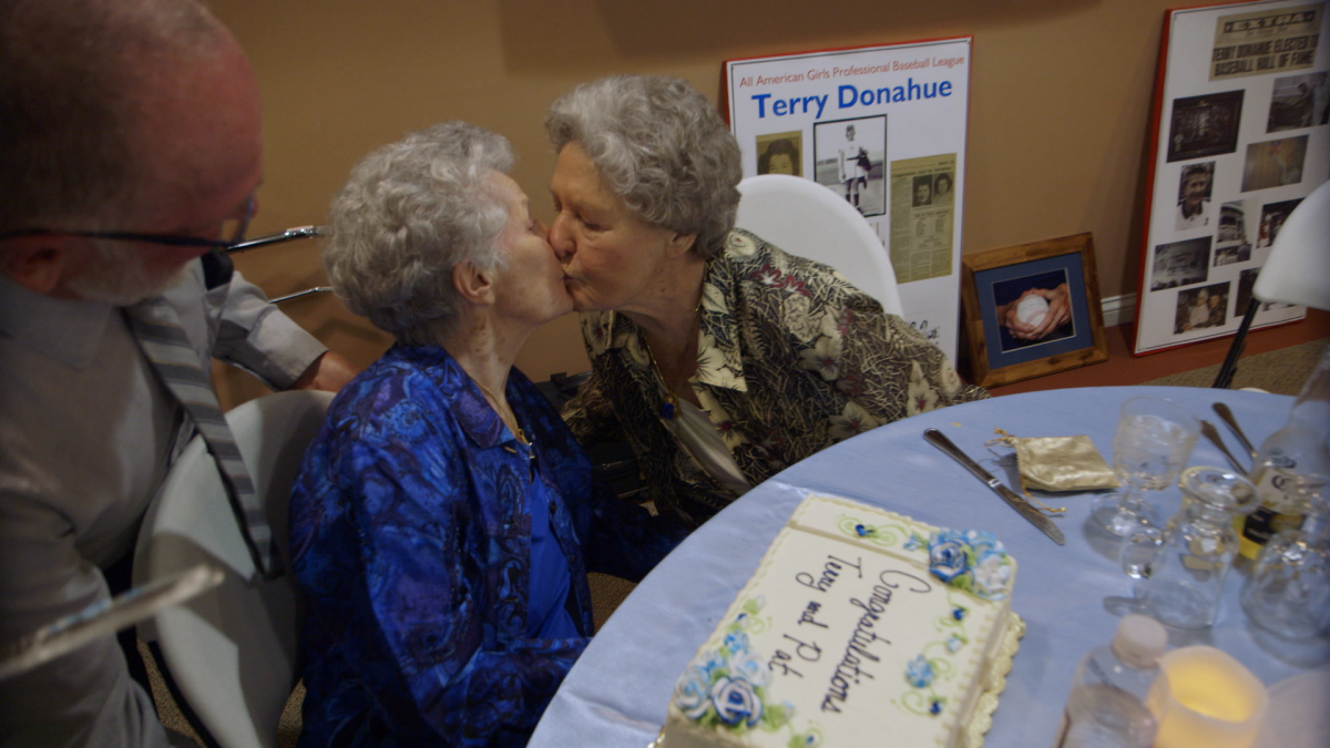 Terry Donahue and Pat Henschel kiss at their wedding in the documentary 'A Secret Love'