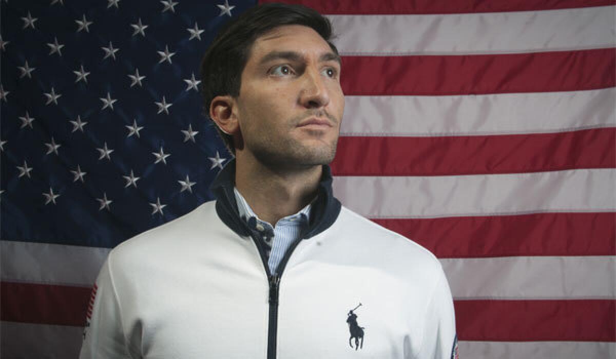 Evan Lysacek poses for a photo at the Team USA Media Summit in Park City, Utah.