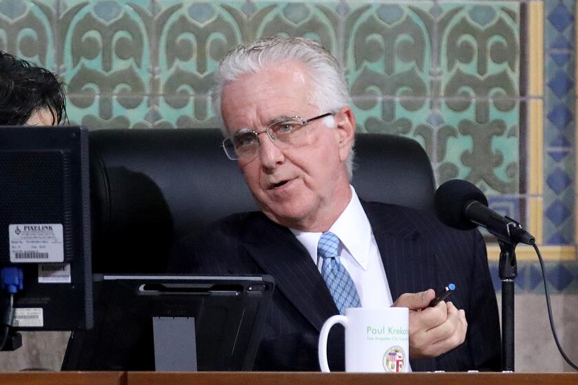 LOS ANGELES, CA - NOVEMBER 01: L.A. City Council President Paul Krekorian conducts the Los Angeles City Council meeting in the Council Chamber at Los Angeles City Hall on Tuesday, Nov. 1, 2022 in Los Angeles, CA. Los Angeles City Council returns to the chamber today as it continues to address the fallout from the City Hall racism scandal. Weeks after the release of the leaked recording from the October 2021 conversation that included racist comments and redistricting maneuvers, Councilmen Kevin de Leon and Gil Cedillo have defied widespread calls for resignation. (Gary Coronado / Los Angeles Times)