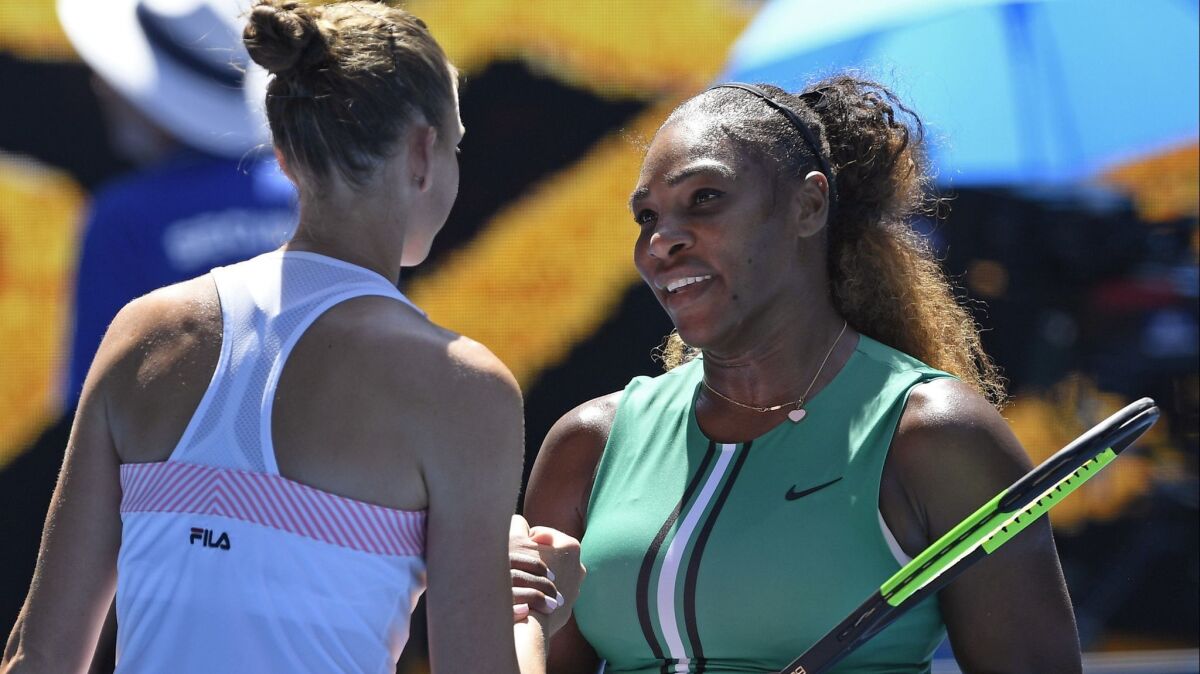 Karolina Pliskova is congratulated by Serena Williams after winning their quarterfinal match at the Australian Open on Wednesday.