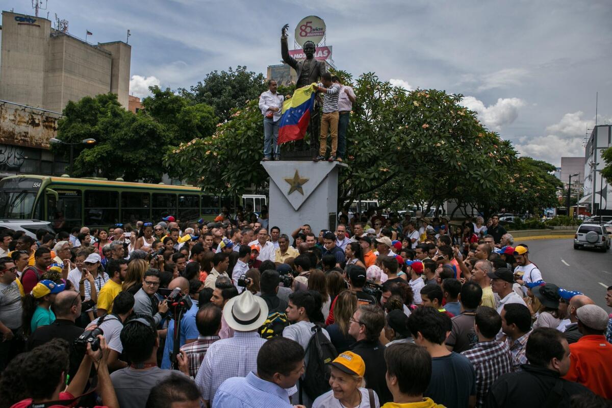 Backers of Venezuelan opposition leader Leopoldo Lopez gather at the Jose Marti de Chacao square in Caracas on Friday.