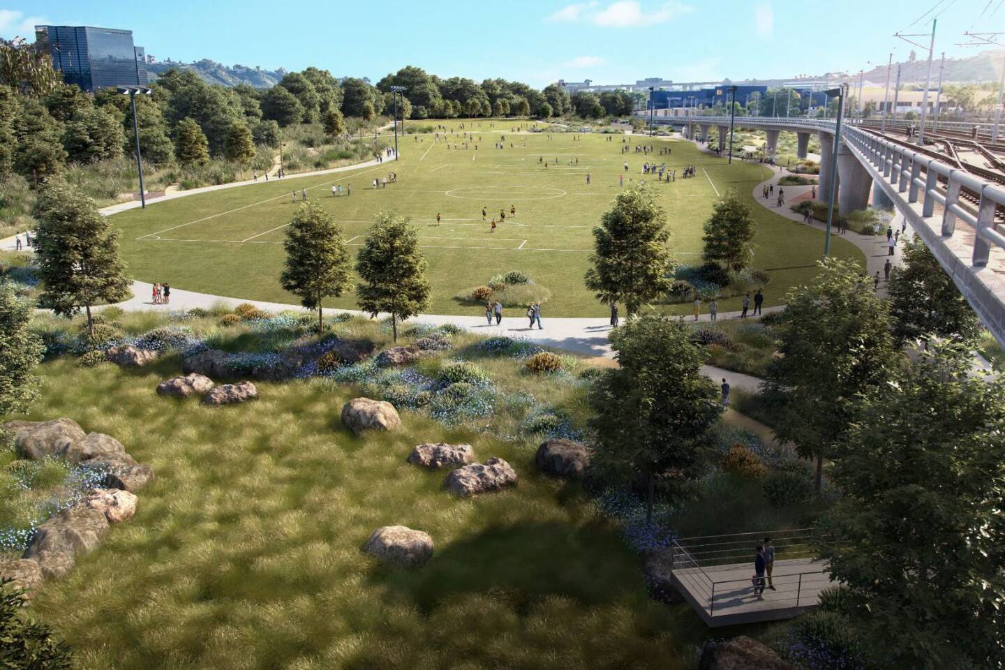 In the foreground of the rendering is a water quality basin with an overlook platform. Stormwater from the site will flow to this location and a few others and will be treated before it enters the river.
