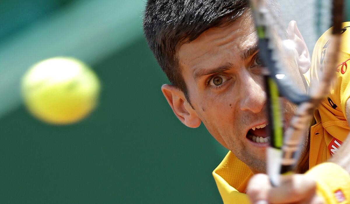 Novak Djokovic of Serbia hits the ball during the quarterfinal match of the Monte Carlo Tennis Masters tournament in Monaco on Friday.