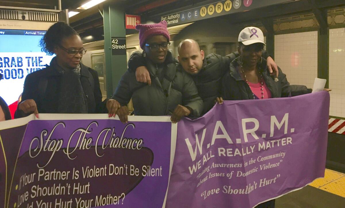 A photo bomber joined a group of New York women's march participants at Times Square.