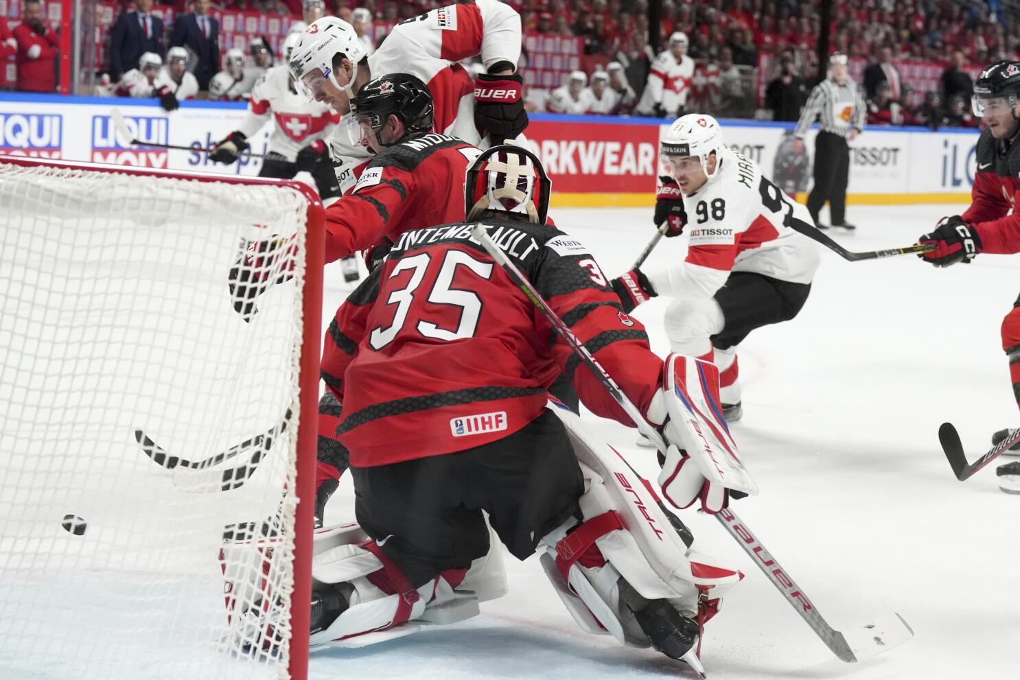 Canada loses to Switzerland, US qualifies for quarters after 5th