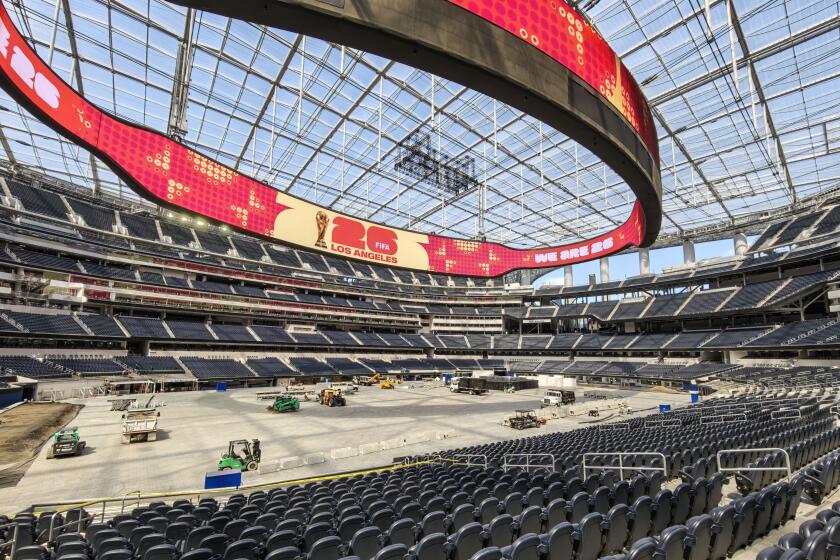 Workers are beginning to get SoFi Stadium ready to host World Cup matches this summer.