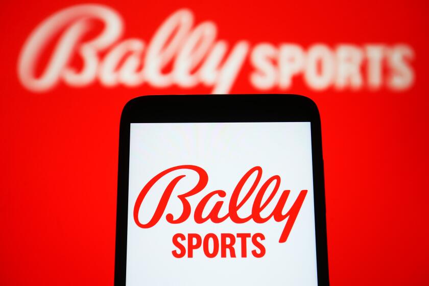 UKRAINE - 2023/03/15: In this photo illustration, Bally Sports logo is seen on a smartphone and on a pc screen.